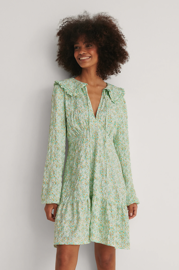 NA-KD Boho Miniklänning med vid halsringning - Flower